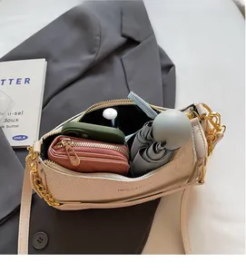 Interior view showing the large storage capacity for a phone, wallet, and umbrella