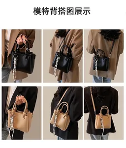 Detail view of stylish crossbody bags in black and beige with silk scarf accents
