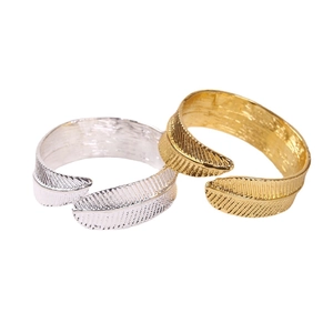 Golden and silver feather-shaped open rings with detailed leaf texture engraving set