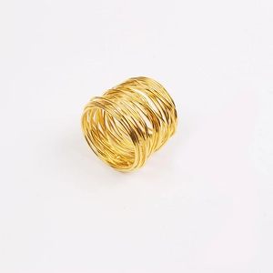 Detailed view of the layered gold wire wrap design on the handcrafted napkin ring