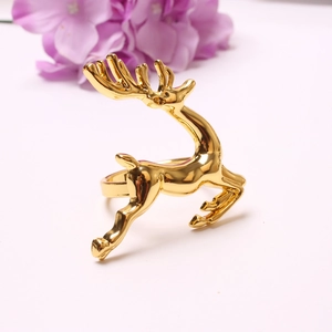 Elegant gold reindeer metal napkin ring with polished mirror finish for table decor