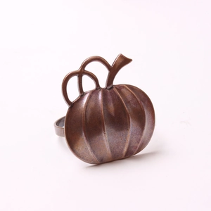 Vintage bronze pumpkin napkin ring with a retro finish for festive table settings