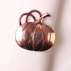 Polished rose gold pumpkin napkin ring for festive Thanksgiving table settings