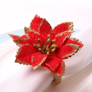Rond de serviette poinsettia rouge avec paillettes dorées et boucle en rotin naturel