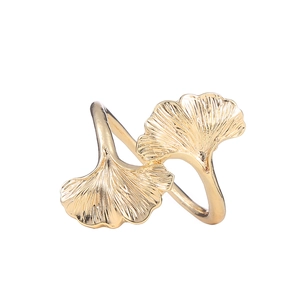 Ginkgo leaf napkin ring with rose gold finish and realistic leaf texture for table decor