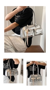 Detail of silver metallic handbag with dual front pockets and star charm detail
