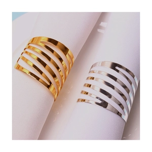 Elegant gold and silver striped metal napkin rings for luxury dining table decoration
