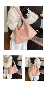 Detailed view of pink pebble grain leather tote bag showing hobo style and large capacity