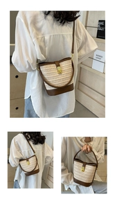 Detail of straw bucket bag with leather trim and gold square buckle in daily life scenes