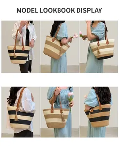 Détail du sac cabas en paille tressée avec blocs de couleurs et pompons décoratifs
