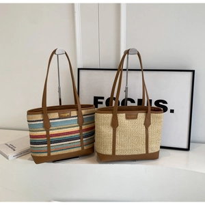 Large straw tote bags with brown leather patchwork handles for summer beach vacations