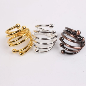 Classic spiral metal napkin rings set in gold, silver and bronze with ball bead accents