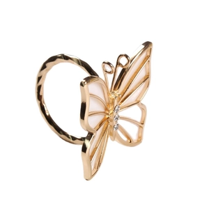 Golden butterfly napkin ring with white shell wings and sparkling crystal rhinestones