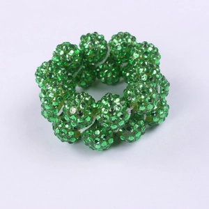 Sparkling green beaded napkin ring with faceted crystals for elegant Christmas table decor