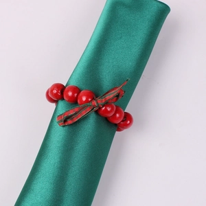 Rond de serviette de Noël en perles de bois rouges avec nœud écossais classique
