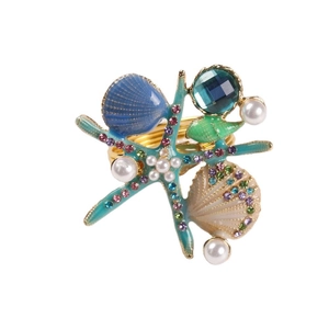 Rond de serviette étoile de mer et coquillage avec cristaux colorés et perles