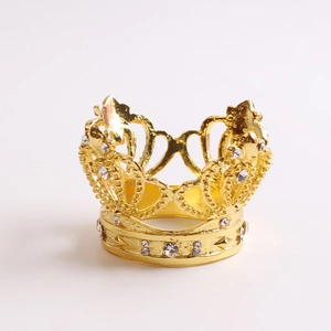 Elegant gold crown napkin ring with sparkling white rhinestones for table decoration