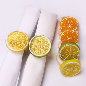 Detailed view of realistic lemon slice napkin rings with natural wooden ring base
