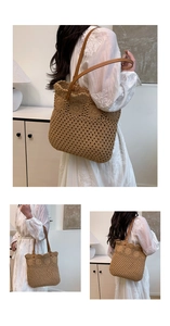 Detailed macro view of handmade crochet tote bag featuring leather straps and hollow textures