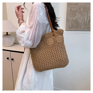 Close-up of hollow cotton rope weave and premium leather shoulder strap on tote bag