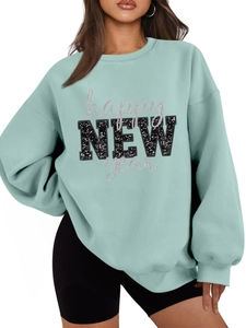 Detail von mintgrünem Übergroßer festlicher Sweatshirt mit happy NEW year Pailletten