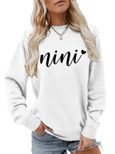 Detail of white cotton sweatshirt with black nini script and small heart print