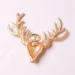 Golden American deer head decorative handle with detailed metal horn texture and relief