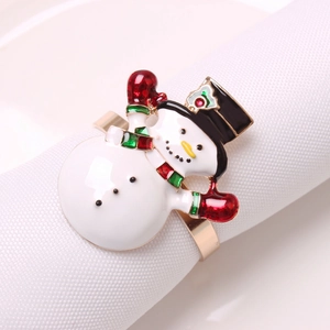 Christmas snowman napkin ring in gold alloy with festive red and green enamel finish