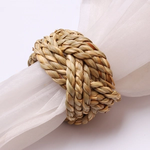Handmade woven corn husk napkin ring with natural grass fiber for rustic table decor