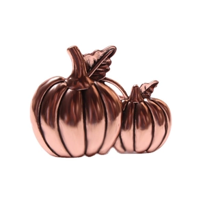 Rose gold pumpkin napkin ring set with brushed metal texture and leaf detail