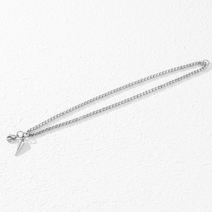 Bracciale con ciondolo a rivetto in acciaio placcato oro 18K con catena tennis scintillante