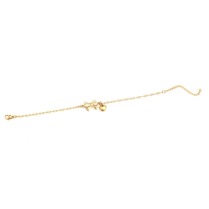 Elegant gold stainless steel bracelet with bow and heart pendants on white background