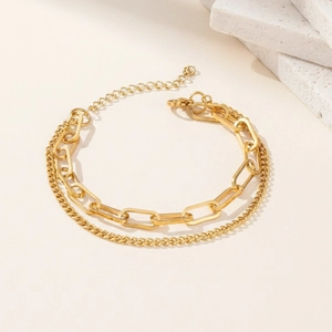 Double-layered gold paperclip link bracelet with adjustable chain for women