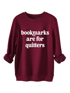Detail of burgundy sweatshirt showing ribbed cuffs and soft fleece lining texture