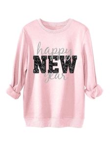 Detailansicht des rosa Sweatshirts mit Happy New Year Pailletten-Druck und Rollbündchen
