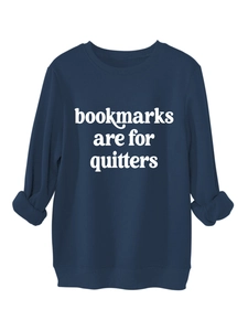 Detail of navy blue sweatshirt showing Bookmarks Are For Quitters white printed text
