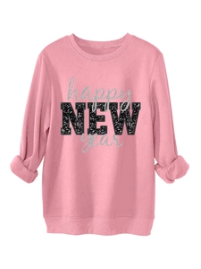 Detailansicht eines pinkfarbenen Sweatshirts mit glitzerndem Happy NEW Year Schriftzug