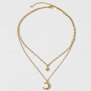 Gold double-layer stainless steel necklace featuring star and moon pendants for women