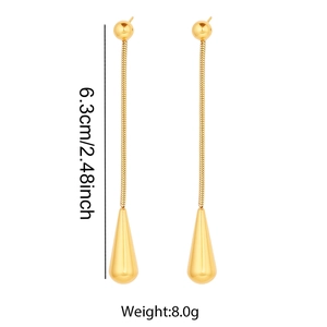 Detail view of 6.3cm gold teardrop earrings showing the long chain and smooth polished finish