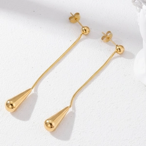 Elegant gold stainless steel waterdrop earrings displayed on a white textured background