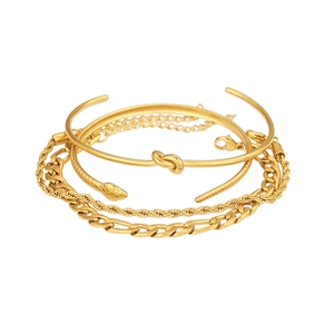Detail view of 4-piece gold bracelet set featuring snake head cuff and twisted link chains