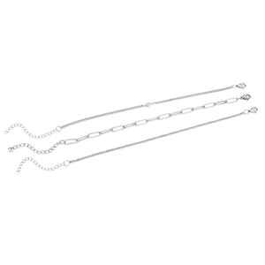 Detailed set of three silver stainless steel paperclip and zircon link bracelets with clasps
