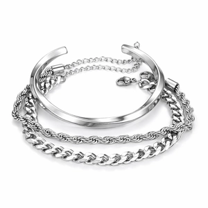 Three-piece silver stainless steel jewelry set with twisted cuff and Cuban chain bracelets