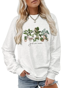 Detail of soft gray sweatshirt featuring watercolor potted plants and just one more text