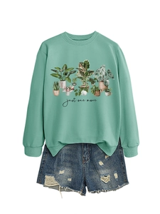 Mint green crewneck sweatshirt with potted plant print and just one more text detail