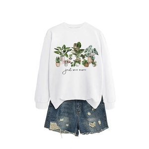 Casual white crewneck sweatshirt with plant print and distressed denim shorts set
