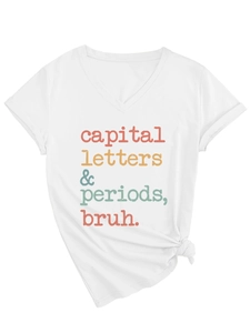 Close-up of white V-neck T-shirt with colorful capital letters and stylish knotted hem