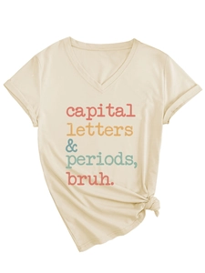 Detail of beige V-neck t-shirt with capital letters print and stylish knotted hem