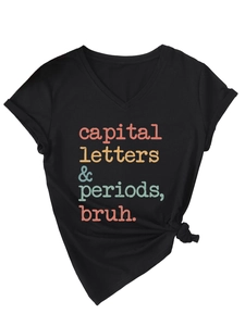 Close-up of black V-neck T-shirt with vintage colorful text and decorative side knot detail