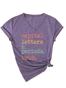 Detail of V-neck purple t-shirt with fixed rolled sleeves and stylish front hem knot